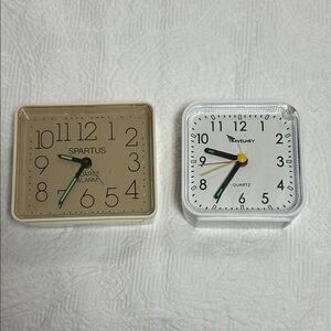 Two Travel Alarm Clocks